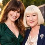 Kathryn Hahn posing with an older blonde-haired woman at a red-carpet event.